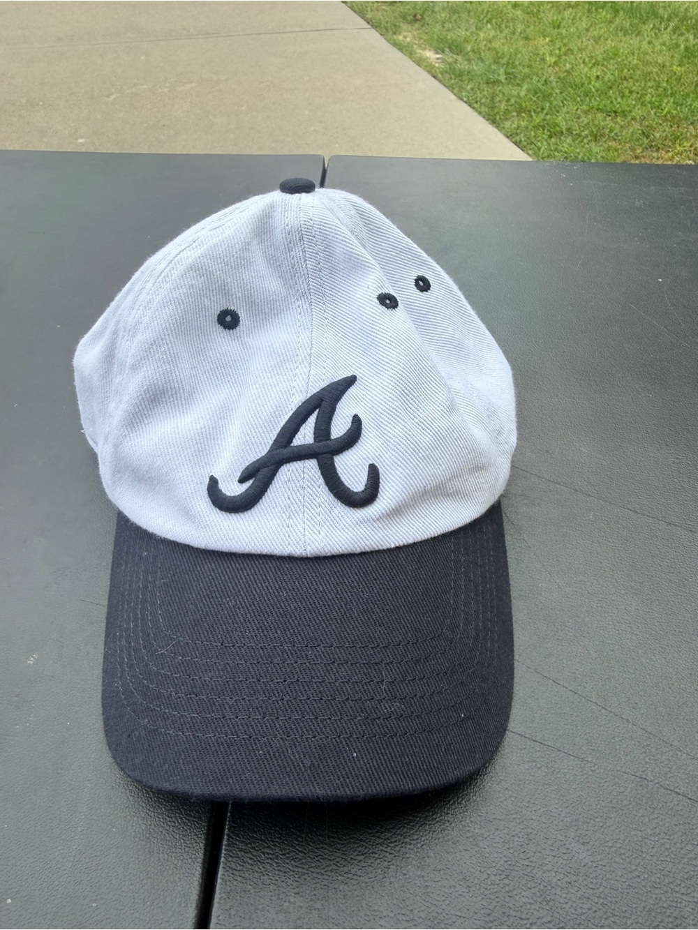 47 Atlanta Braves cap with cursive 'A'